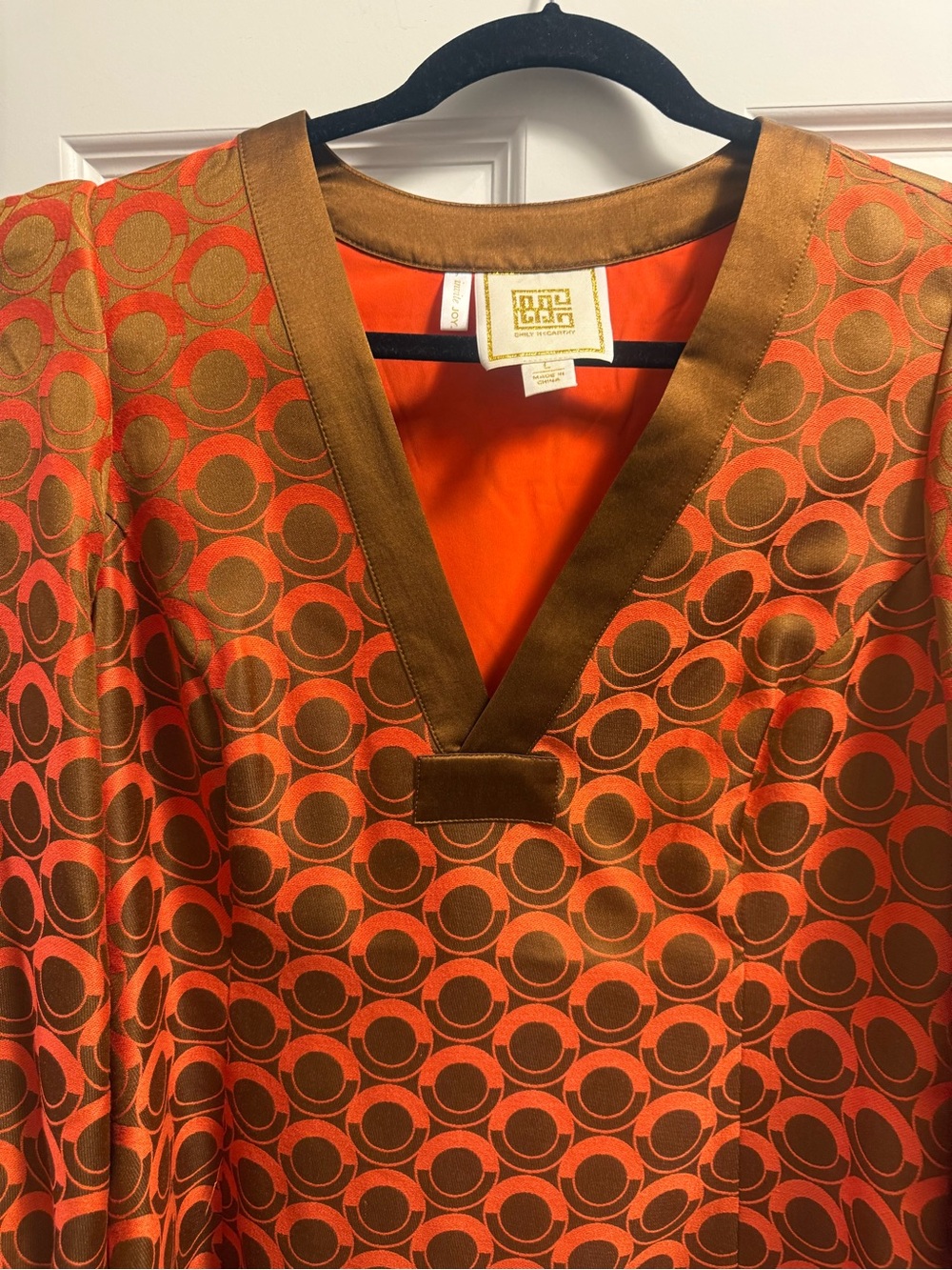 Emily McCarthy Vintage-Inspired Orange and Brown Circle-Print V-Neck Dres